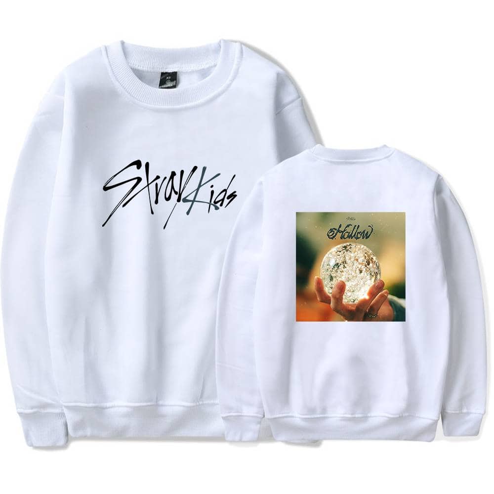 Stylish white sweatshirt with "Stray Kids" printed on the front and a mystical crystal ball design on the back, perfect for K-pop fandom fans.