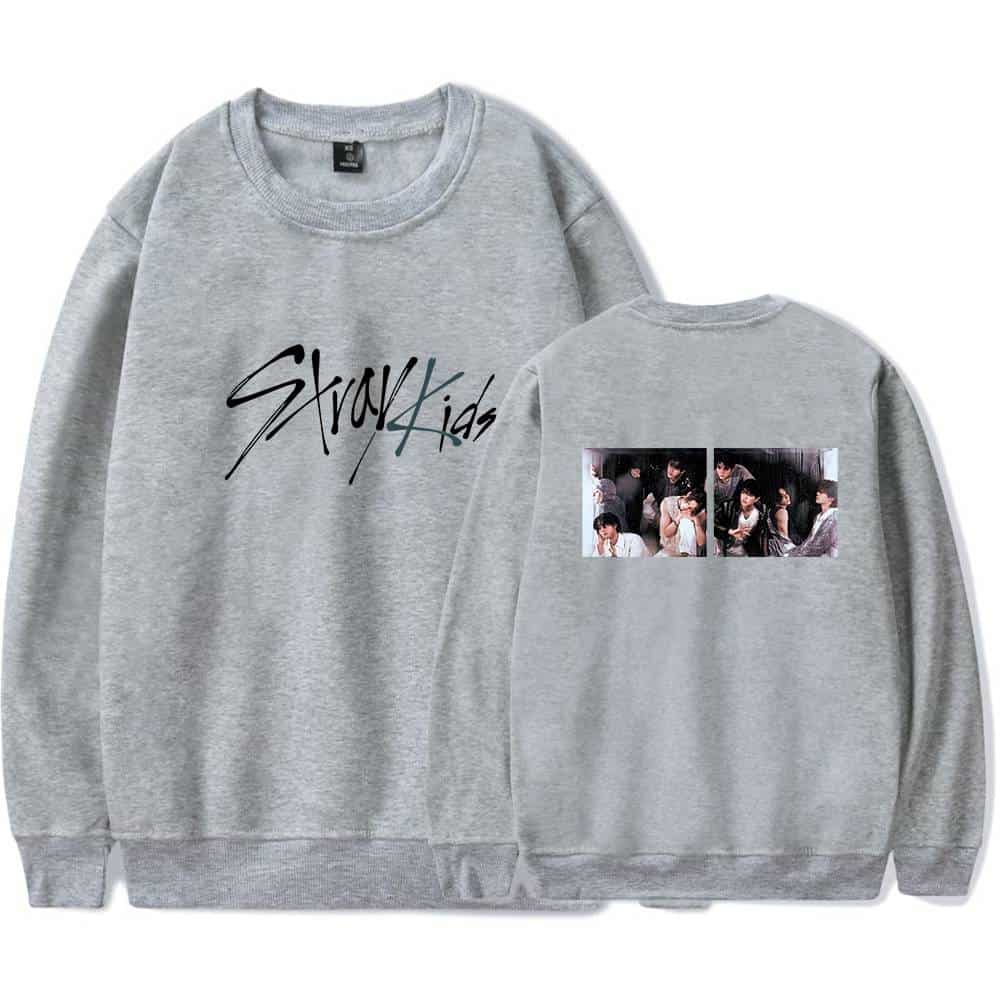 Plain grey sweatshirt with "Stray Kids" logo on front and group photo on back, perfect for K-pop fans.