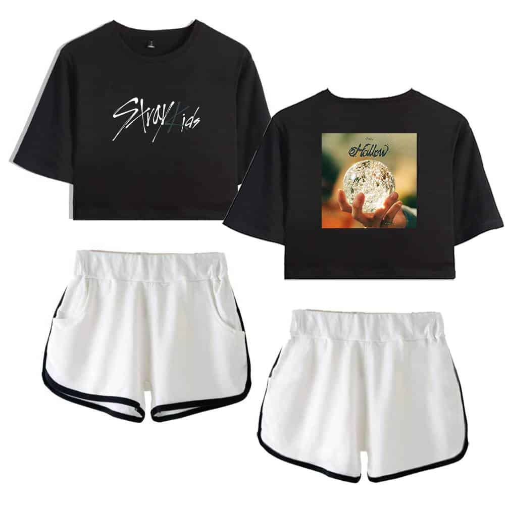 Black crop top with "Stay" written on it and a photo of a hand holding a glowing crystal ball with "Follow" text, paired with white shorts with black trim.