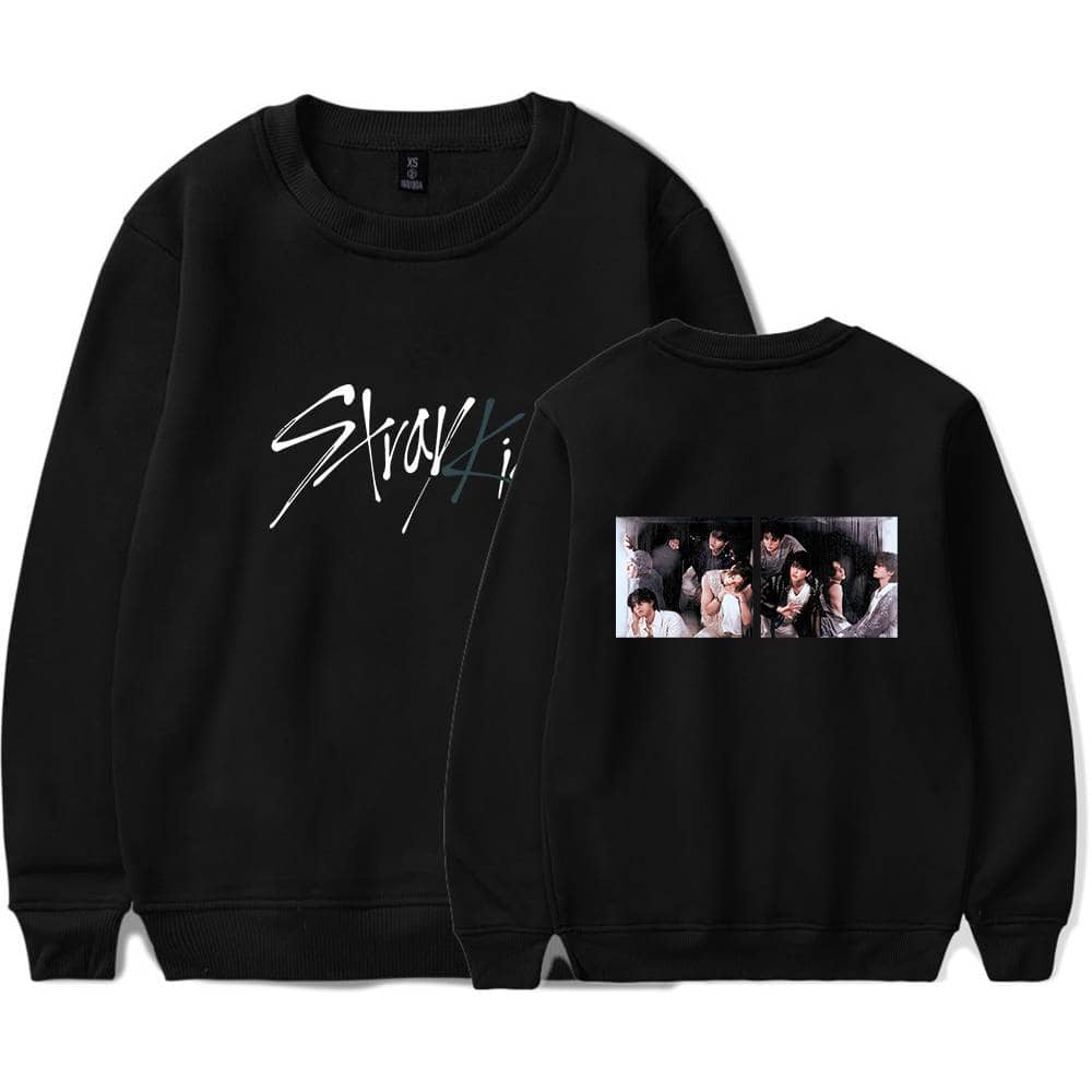 Black sweatshirt featuring K-pop band members and stylish text design. Perfect for fans to showcase their favorite K-pop group. Comfortable and trendy Kpop merch.