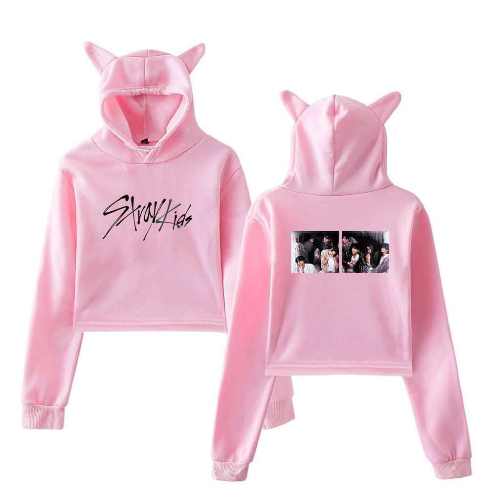 Pink K-pop hoodie with cat ears and "Stray Kids" logo on front, matching pants, and photos on back, themed for Stray Kids fans.