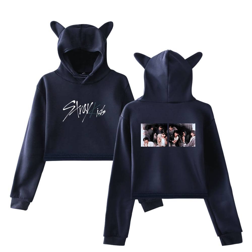 Kpop merch hoodie set with animal ears and group photo print on back.
