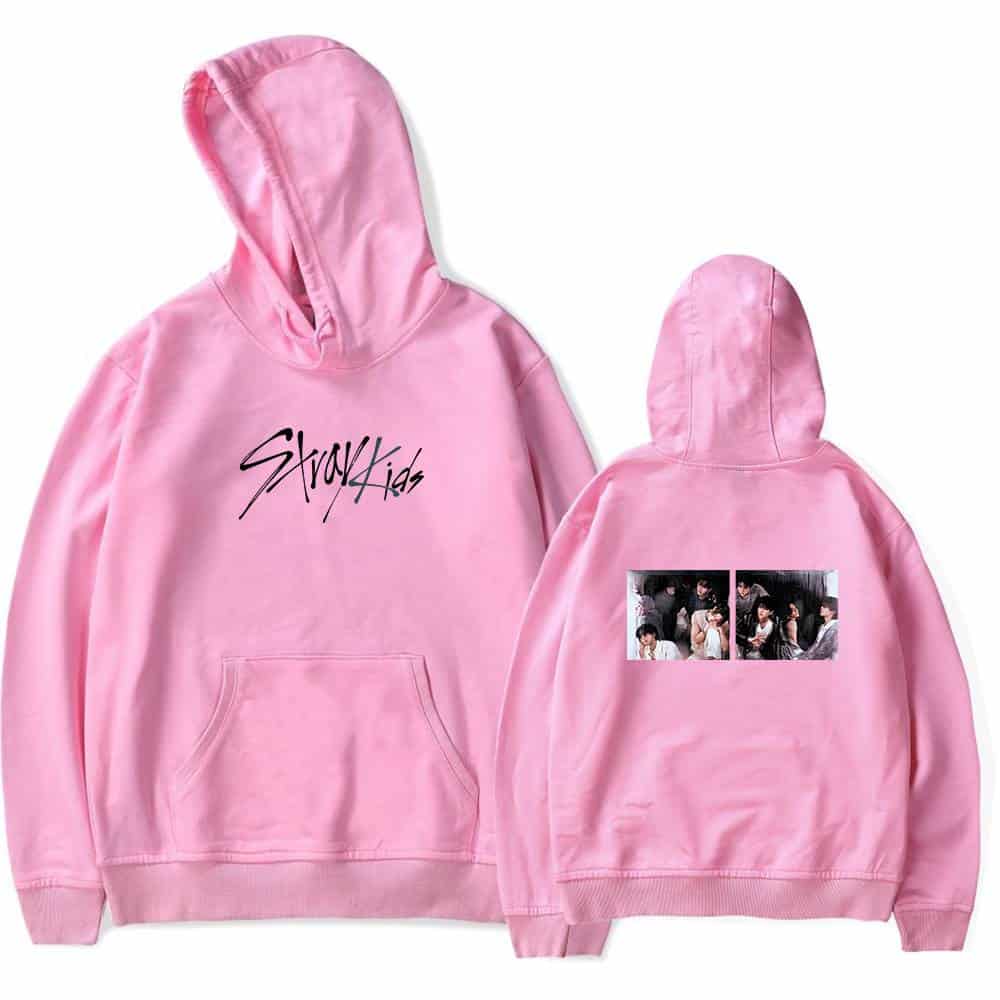 Pink hoodie with black graphic text and group photo print on back, casual streetwear kpop merch.
