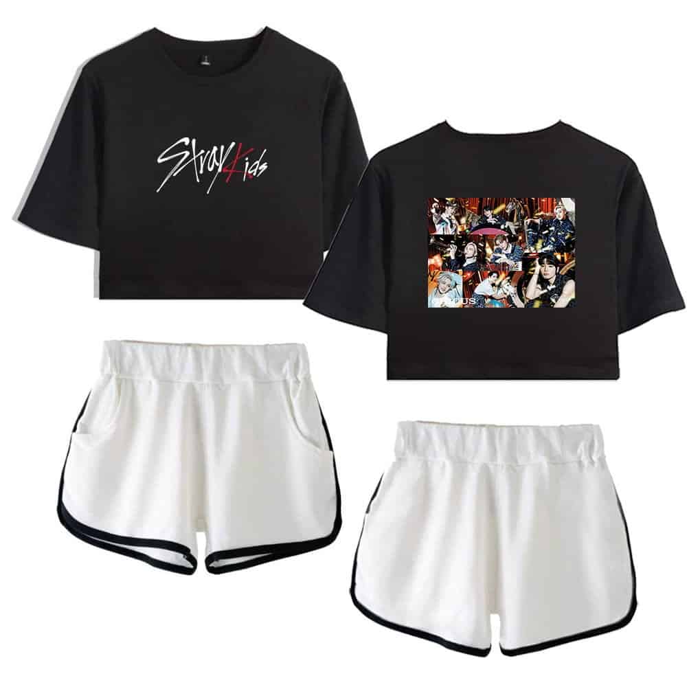 Kpop merch black crop top with group photo print and slogan graphic design, white athletic shorts with black trim, casual sporty style for fans.