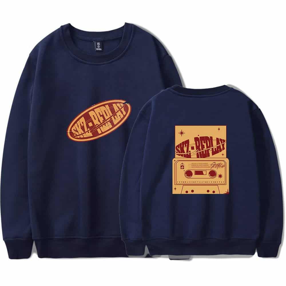 Bright blue K-pop merch sweatshirt featuring retro cassette tape and logo design, perfect for fans and collectors. Great for showcasing your love for Korean pop music and idols.