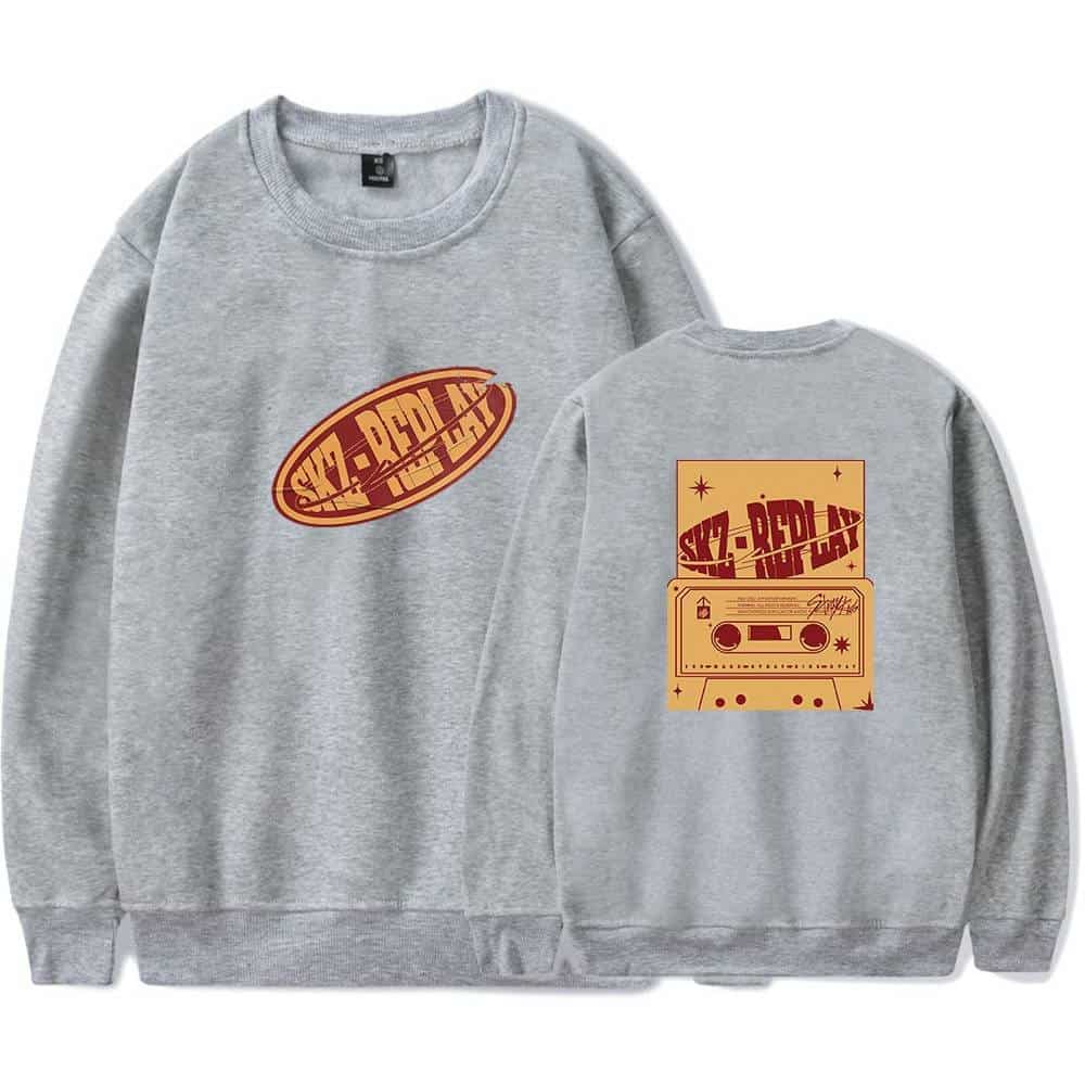 Vintage grey sweatshirt with bold graphic print of "STZ-REDAY" and a retro cassette tape design, perfect for K-pop fans and merch collectors.