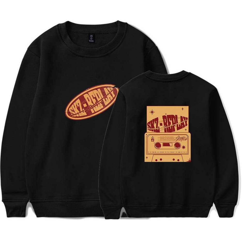 Sweatshirt with SKZ-PARDI ART design and cassette tape graphics.