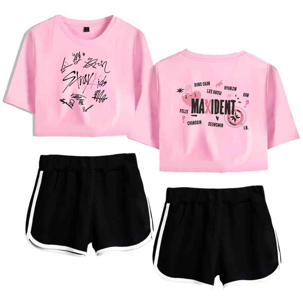 Colorful K-pop merch set featuring pink graphic t-shirts with signatures and logo, paired with black shorts with white trim. Perfect for K-pop fans and concerts.
