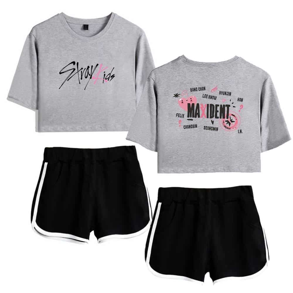 Cute K-pop merchandise featuring graphic crop tops with fan-favorite band designs and comfortable black shorts for fans and fashion enthusiasts alike.